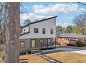Charming two story home with black framed windows and modern color palette at 665 Ferris St, Atlanta, GA 30310