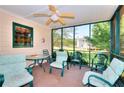Relaxing screened porch with comfortable seating and views of the backyard at 3740 Laurel Brook Way, Snellville, GA 30039