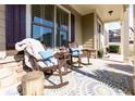 Relaxing front porch featuring rocking chairs and a welcoming ambiance at 2601 Boulder Way, Woodstock, GA 30188