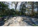 Spacious stone patio with comfortable seating, perfect for outdoor relaxation and entertainment at 3 Demorest Ne Ave, Atlanta, GA 30305