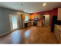 Functional kitchen with modern appliances, wooden cabinets, and granite countertops at 4341 Savannah Ln, Atlanta, GA 30349