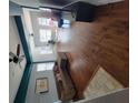 Bright living room featuring hardwood floors, a comfortable sofa, and modern decor at 475 Sw Willard Ave, Atlanta, GA 30310