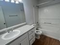 Clean bathroom featuring a vanity with sink, updated fixtures, a mirror, and a shower-tub combination at 114 Seasons Pkwy, Norcross, GA 30093