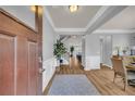Inviting foyer with hardwood floors, neutral paint, and elegant trim, leading into an open floor plan at 3510 Meadow Grass Dr, Dacula, GA 30019