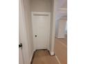 Hallway view shows a solid white door with black hardware and fresh paint at 879 Highway 101 N, Dallas, GA 30157