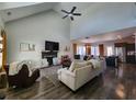Spacious living room with high ceilings, modern furniture, and fireplace at 1132 Red Bud Cir, Villa Rica, GA 30180