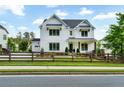 Beautiful two-story home with a well-manicured lawn and a modern farmhouse design at 2201 Old Dallas Sw Rd, Marietta, GA 30064