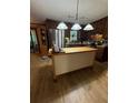 Spacious kitchen island with hardwood floors and stainless appliances at 3876 Winners Ct, Marietta, GA 30062