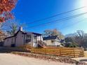 Charming home with a picket fence and landscaped front yard providing curb appeal at 1074 Hobson Sw St, Atlanta, GA 30310