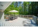 Spacious back deck with an umbrella table offers great outdoor entertaining at 1907 Shalimar Ne Dr, Atlanta, GA 30345