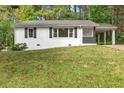 Inviting one-story home with a well-maintained lawn and a covered carport at 3406 Jackson Dr, Decatur, GA 30032