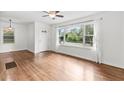Bright living room featuring hardwood floors, large windows, and ample natural light at 3406 Jackson Dr, Decatur, GA 30032