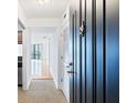 Entry hallway with tiled floors leading to living area and kitchen view at 2870 Pharr Court South Nw # 1704, Atlanta, GA 30305