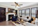 Inviting living room features a fireplace, contemporary decor, and ample natural light for a cozy atmosphere at 371 Northaven Ave, Suwanee, GA 30024