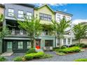 Stylish townhome offers attractive architectural details and appealing landscaping at 758 Cady Way, Atlanta, GA 30312