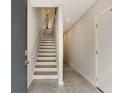 Modern entryway with staircase, light gray walls, and concrete floors at 1356 Peter Haughton Nw Way, Atlanta, GA 30318