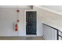 Exterior door to unit featuring security and classic design at 1150 Collier Nw Rd # K18, Atlanta, GA 30318
