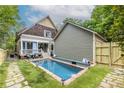 Beautiful backyard with a refreshing in-ground pool and cozy outdoor seating area at 655 Moreland Se Ave, Atlanta, GA 30316