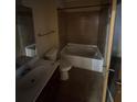 Bathroom with a tile shower, soaking tub, toilet, and vanity with sink at 898 Oak St # 3412, Atlanta, GA 30310