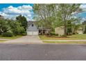 Charming two-story home featuring a two-car garage, well-maintained lawn, and attractive landscaping at 1533 Fallen Leaf Sw Dr, Marietta, GA 30064