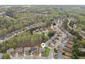 Aerial view of the neighborhood with mature trees and well-maintained homes, showcasing community living at 2710 Irwin Ct, Cumming, GA 30041