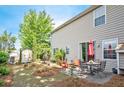 Spacious backyard with a patio area, lawn, and convenient storage shed at 238 Diamond Valley Pass, Canton, GA 30114