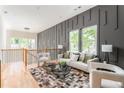 Upstairs living room boasting a unique accent wall and lots of natural light at 156 Martha Ne Ave, Atlanta, GA 30317