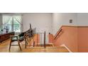 View of entryway and staircase; door on the main level and stairs leading down and up at 3990 Admiral Dr, Chamblee, GA 30341