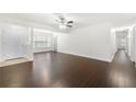 Spacious open-concept living room featuring sleek floors and neutral walls at 1307 Madison Se Ln, Smyrna, GA 30080