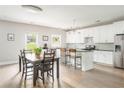 Bright, open kitchen features stainless steel appliances, island, and ample cabinet space at 2484 Mcafee Rd, Decatur, GA 30032