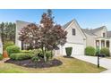 Well maintained front yard, showing the manicured lawn and neat landscaping at 1620 Diplomat Dr, Cumming, GA 30041