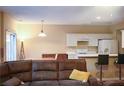 Inviting living space with an open floor plan, connecting the living room and kitchen area at 4208 Royal Regency Nw Cir # 9, Kennesaw, GA 30144