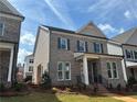 Attractive brick and siding two-story home with manicured lawn, inviting curb appeal at 146 Birch Tree Way, Cumming, GA 30040