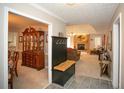Welcoming home foyer that flows into the living room with cozy fireplace at 1030 E Lakehaven Way, Mcdonough, GA 30253
