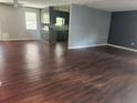 Spacious open-concept living room featuring hardwood floors and lots of natural light at 3190 Grand Central Dr, Snellville, GA 30078