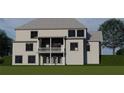 A large two-story home boasts a balcony and multiple windows for lots of light with lawn at 2856 Octavia Cir, Marietta, GA 30062