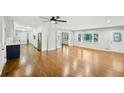 Expansive living room featuring hardwood floors and views of the outdoor landscape at 2301 Crestcliff Dr, Tucker, GA 30084
