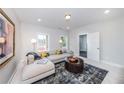 Cozy living room with a comfortable sectional couch and natural light at 1417 Coretta Scott Bnd, Atlanta, GA 30318