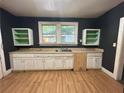 Kitchen with lots of natural light, ample counter space and room for upgrades at 39 N Broad St, Covington, GA 30014