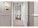 Inviting hallway with tile flooring leading to a bright living space in condo unit 1409 at 850 Piedmont Ne Ave # 1409, Atlanta, GA 30308