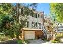 Beautiful townhome with private balcony and garage, nestled within a serene, tree-lined neighborhood at 104 Terrace Ne Dr # 1, Atlanta, GA 30305