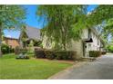 Charming brick home with a well-manicured lawn, lush greenery, and inviting curb appeal at 798 Saint Charles Ne Ave # 7, Atlanta, GA 30306