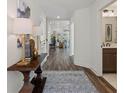 Inviting home entryway with hardwood floors, stylish décor, and views into the spacious living areas at 1307 Cedarcrest Blvd, Acworth, GA 30101