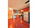 Well-equipped kitchen with stainless steel appliances and warm wood cabinetry at 898 Oak Sw St # 1418, Atlanta, GA 30310