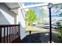 Inviting front porch with view of the parking and green spaces at 277 Clearview Ct, Villa Rica, GA 30180