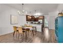 Eat-in kitchen boasts stainless appliances, granite counters, and stylish pendant lighting at 1365 Memorial Se Dr # 8, Atlanta, GA 30317