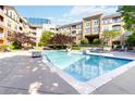 Serene swimming pool with clear blue water and lounging area in modern apartment complex at 10 Ne Perimeter Summit Ne Blvd # 4428, Brookhaven, GA 30319