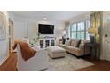Bright living room with stylish furnishings, neutral color palette, and abundant natural light at 1788 Beacon Hill Ne Blvd, Atlanta, GA 30329