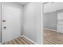 Inviting entryway featuring wood-look flooring and neutral paint at 3500 Stonewall Pl, Atlanta, GA 30339