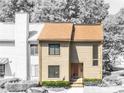 Charming two-story townhouse featuring a well-maintained lawn and a welcoming front entrance at 3500 Stonewall Pl, Atlanta, GA 30339